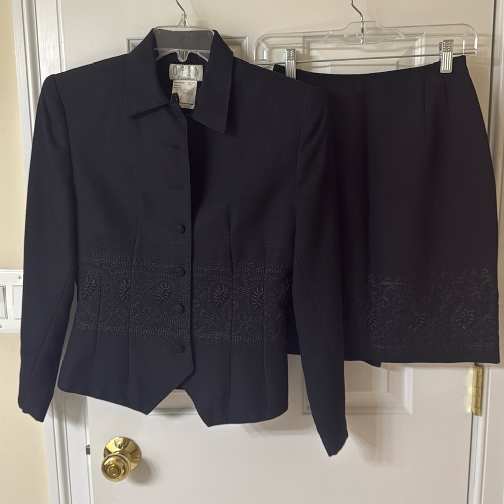 Little black 2 piece skirt suit, size 6, worn once. Has beautiful embroidery.